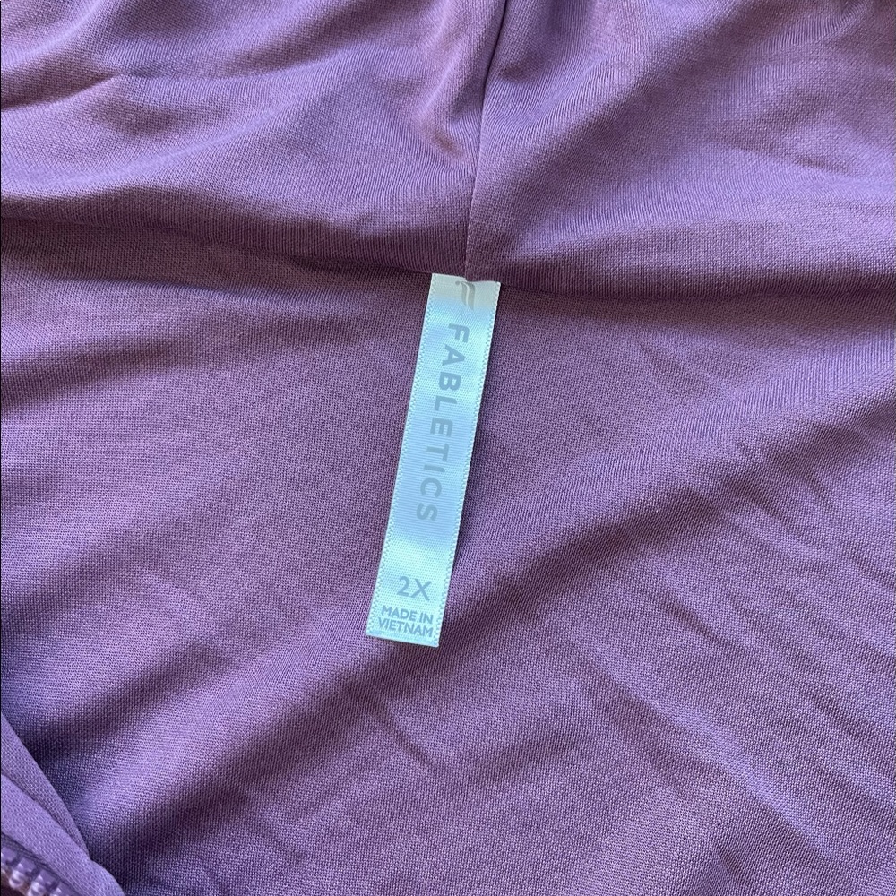 Nice soft material, stretchy, in a mauve/purple color